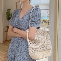 Retro Hollow Straw Woven Solid Color Bucket Bag Nhxm409038